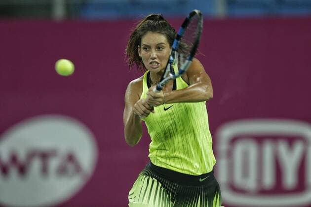 Ipek Soylu of Turkey returns a shot as she and Viktorija Golubic of Switzerland compete against Martina Hingis of Switzerland and Jelena Jankovic of Serbia during their women s doubles quarterfinal match of the WTA Tennis Damen Guangzhou Open 2016 in Guangzhou city, south China s Guangdong province, 22 September 2016. Martina Hingis Jelena Jankovic defeated Viktorija Golubic Ipek Soylu 2:0 (6-0 6-1). Hingis Jankovic advance to semifinal at WTA Guangzhou Open  pbu507850_05