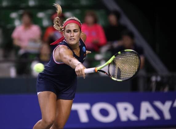 September 23, 2016, Tokyo, Japan - Rio de Janeiro Olympics gold medalist Monica Puig of Puerto Rico returns the ball against Agnieszka Radwanska of Poland during the quarter finals of the Toray Pan Pacific Open tennis championships in Tokyo on Friday, September 23, 2016. Radwanska defeated Puig 6-2, 6-3.  (lwxa004842)