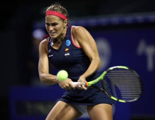 September 23, 2016, Tokyo, Japan - Rio de Janeiro Olympics gold medalist Monica Puig of Puerto Rico returns the ball against Agnieszka Radwanska of Poland during the quarter finals of the Toray Pan Pacific Open tennis championships in Tokyo on Friday, September 23, 2016. Radwanska defeated Puig 6-2, 6-3.  (lwxa004850)