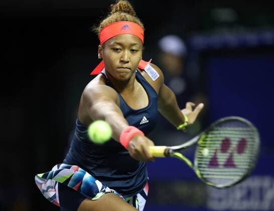 September 23, 2016, Tokyo, Japan - Japan s Naomi Osaka returns the ball against Aliaksandra Sasnovich of Belarus during the quarter finals of the Toray Pan Pacific Open tennis championships in Tokyo on Friday, September 23, 2016. Osaka defeated Sasnovich 6-3, 7-6.  (lwxa004852)