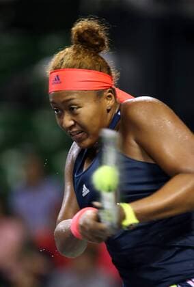September 23, 2016, Tokyo, Japan - Japan s Naomi Osaka returns the ball against Aliaksandra Sasnovich of Belarus during the quarter finals of the Toray Pan Pacific Open tennis championships in Tokyo on Friday, September 23, 2016. Osaka defeated Sasnovich 6-3, 7-6.  (lwxa004854)