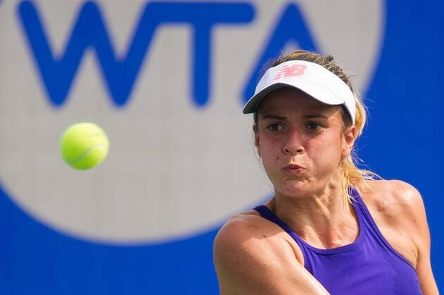WUHAN, CHINA - SEPTEMBER 23: Nicole Gibbs of the United States returns a shot against Elizaveta Kulichkova of Russia during the qualifying match of 2016 WTA Tennis Damen Dongfeng Motor Wuhan Open at Optics Valley International Tennis Center on September 23, 2016 in Wuhan, China.  CFP492555723 