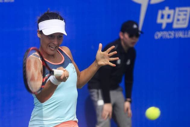 WUHAN, CHINA - SEPTEMBER 23: Tatjana Maria of Germany returns a shot against Kateryna Bondarenko of the Ukraine during the qualifying match of 2016 WTA Tennis Damen Dongfeng Motor Wuhan Open at Optics Valley International Tennis Center on September 23, 2016 in Wuhan, China.  CFP492556011 