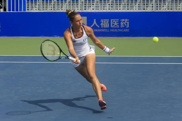 WUHAN, CHINA - SEPTEMBER 23: Kateryna Bondarenko of the Ukraine returns a shot against Tatjana Maria of Germany during the qualifying match of 2016 WTA Tennis Damen Dongfeng Motor Wuhan Open at Optics Valley International Tennis Center on September 23, 2016 in Wuhan, China.  CFP492556015 