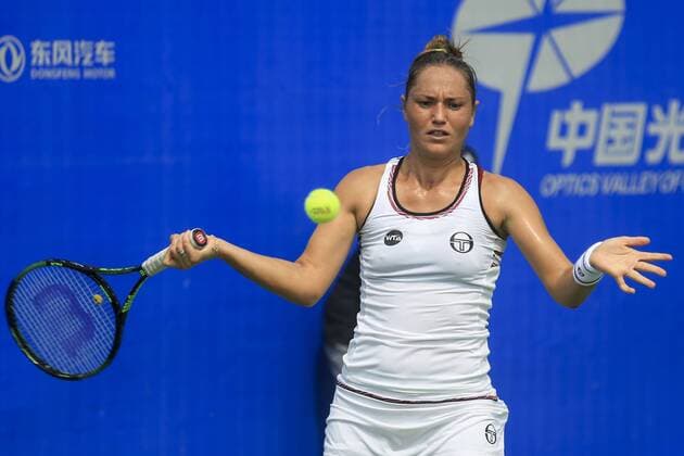 WUHAN, CHINA - SEPTEMBER 23: Kateryna Bondarenko of the Ukraine returns a shot against Tatjana Maria of Germany during the qualifying match of 2016 WTA Tennis Damen Dongfeng Motor Wuhan Open at Optics Valley International Tennis Center on September 23, 2016 in Wuhan, China.  CFP492556018 