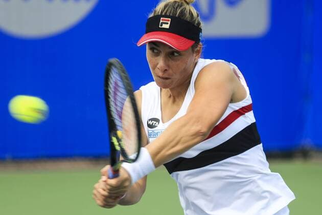 WUHAN, CHINA - SEPTEMBER 23: Marina Erakovic of New Zealand returns a shot against Louisa Chirico of the United States during the qualifying match of 2016 WTA Tennis Damen Dongfeng Motor Wuhan Open at Optics Valley International Tennis Center on September 23, 2016 in Wuhan, China.  CFP492556098 