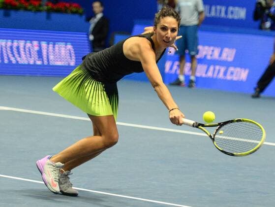 ST PETERSBURG, RUSSIA â€“ SEPTEMBER 25, 2016: Anastasia Myskina of Russia returns the ball in a mixed doubles match as part of the tennis legends show at the 2016 St. Petersburg Open. Andrei Ivanov TASS  TS032579