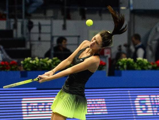 ST PETERSBURG, RUSSIA â€“ SEPTEMBER 25, 2016: Anastasia Myskina of Russia returns the ball in a mixed doubles match as part of the world tennis legends show at the 2016 St. Petersburg Open. Andrei Ivanov TASS  TS03257B