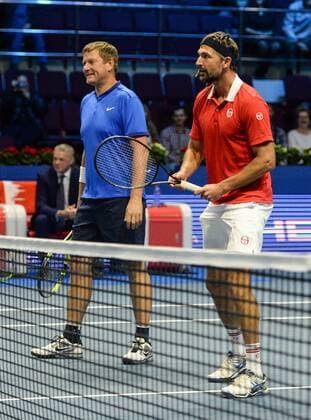 ST PETERSBURG, RUSSIA â€“ SEPTEMBER 25, 2016: Yevgeny Kafelnikov (L) of Russia and Goran Ivanisevic of Croatia in action in a mixed doubles match as part of the world tennis legends show at the 2016 St. Petersburg Open. Andrei Ivanov TASS  TS03258D