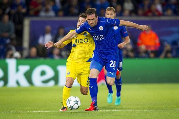 27.09.2016. King Power Stadium, Leicester, England. UEFA Champions League Football. Leicester City versus FC Porto. Christian Fuchs of Leicester City holds off Otavio of FC Porto. xGrahamxWilsonx  ActionPlus11793856
