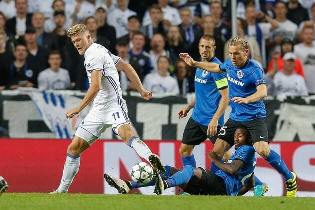 Kobenhavn s Andreas Cornelius , Club s Stefano Denswil and Club s Rudy Ruud Vormer fight for the ball during a soccer game between Danish club F.C. Kobenhavn and Belgian team Club Brugge KV in Copenhagen, Denmark, Tuesday 27 September 2016, the second game in the group stage of the UEFA Champions League competition, in group G. BRUNOxFAHY  x04941968x