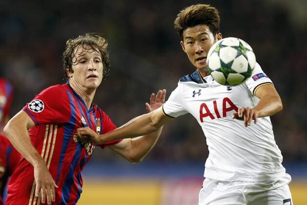 MOSCOW, RUSSIA - SEPTEMBER 27, 2016: CSKA Moscow s Mario Fernandes (L) and Tottenham Hotspur s Heung-Min Son struggle for the ball in their 2016 17 UEFA Champions League Group Stage football match at the Arena CSKA stadium. CSKA Moscow won the game 3:2. Mikhail Japaridze TASS  TS032986