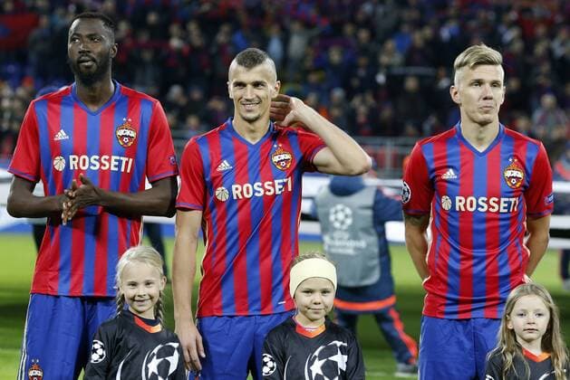MOSCOW, RUSSIA - SEPTEMBER 27, 2016: CSKA Moscow s Lacina Traore, Roman Eremenko, and Pontus Wernbloom (L-R back) pose for a photograph before their 2016 17 UEFA Champions League Group Stage football match against Tottenham Hotspur at the Arena CSKA stadium. CSKA Moscow won the game 3:2. Mikhail Japaridze TASS  TS032975