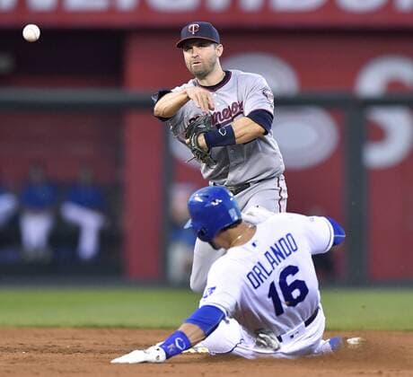 September 27, 2016 - Kansas City, MO, USA - Minnesota Twins second baseman Brian Dozier forces out the Kansas City Royals Paulo Orlando (16) and completes the double play on Alcides Escobar in the third inning on Tuesday, Sept. 27, 2016, Kauffman Stadium in Kansas City, Mo. Minnesota at Kansas City - ZUMAm67_