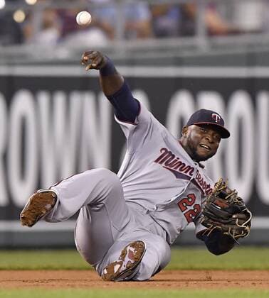 September 27, 2016 - Kansas City, MO, USA - Minnesota Twins second baseman Brian Dozier forces out the Kansas City Royals Paulo Orlando (16) and completes the double play on Alcides Escobar in the third inning on Tuesday, Sept. 27, 2016, Kauffman Stadium in Kansas City, Mo. Minnesota at Kansas City - ZUMAm67_