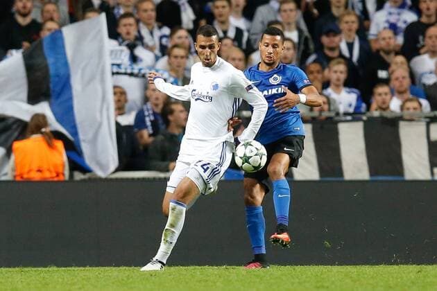 Kobenhavn s Youssef Toutouh and Club s Ricardo van Rhijn pictured in action during a soccer game between Danish club F.C. Kobenhavn and Belgian team Club Brugge KV in Copenhagen, Denmark, Tuesday 27 September 2016, the second game in the group stage of the UEFA Champions League competition, in group G. BRUNOxFAHY  x04942008x