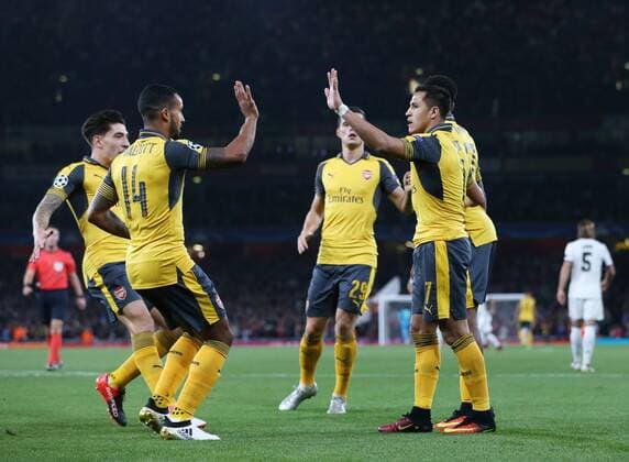 Arsenal s Theo Walcott celebrates scoring his sides opening goal during the Champions League group A match at the Emirates Stadium, London. Picture date September 28th, 2016 Pic David Klein Sportimage EDITORIAL USE ONLY. No use with unauthorised audio, video, data, fixture lists, club league logos or live services. Online in-match use limited to 120 images, no video emulation. No use in betting, games or single club league player publications.