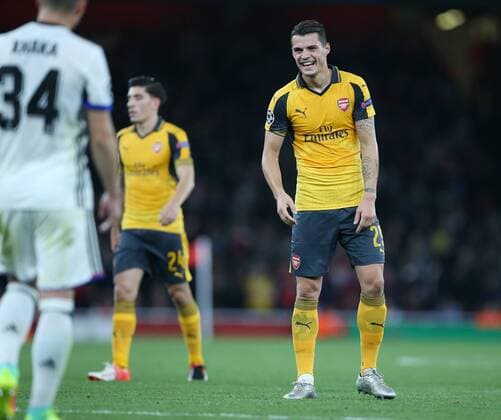 Arsenal s Granit Xhaka shares a joke with his brother Taulant Xhaka of Basel during the Champions League group A match at the Emirates Stadium, London. Picture date September 28th, 2016 Pic David Klein Sportimage EDITORIAL USE ONLY. No use with unauthorised audio, video, data, fixture lists, club league logos or live services. Online in-match use limited to 120 images, no video emulation. No use in betting, games or single club league player publications.