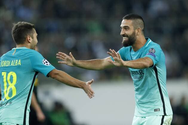 (L-R) Jordi Alba of FC Barcelona Barca Arda Turan of FC Barcelona during the UEFA Champions League group C match between Borussia Monchengladbach and FC Barcelona on September 28, 2016 at the Borussia Park stadium in Monchengladbach, Germany Borussia Monchengladbach v FC Barcelona UEFA Champions League 2016 2017 xVIxxIVx 6307820