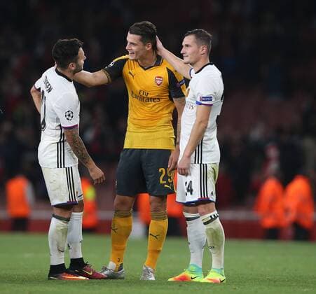 Arsenal s Granit Xhaka embraces brother Taulant Xhaka of Basel at the final whistle during the Champions League group A match at the Emirates Stadium, London. Picture date September 28th, 2016 Pic David Klein Sportimage EDITORIAL USE ONLY. No use with unauthorised audio, video, data, fixture lists, club league logos or live services. Online in-match use limited to 120 images, no video emulation. No use in betting, games or single club league player publications.