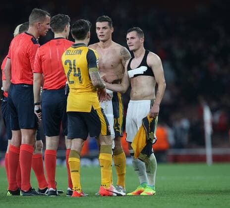 Arsenal s Granit Xhaka embraces brother Taulant Xhaka of Basel at the final whistle during the Champions League group A match at the Emirates Stadium, London. Picture date September 28th, 2016 Pic David Klein Sportimage EDITORIAL USE ONLY. No use with unauthorised audio, video, data, fixture lists, club league logos or live services. Online in-match use limited to 120 images, no video emulation. No use in betting, games or single club league player publications.