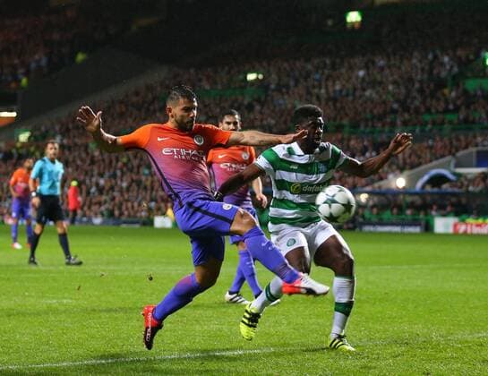 Sergio Aguero of Manchester City gets in front of Kolo Toure of Celtic to direct the ball goal wards during the Champions League Group C match at the Celtic Park Stadium, Glasgow. Picture date: September 28th, 2016. Pic Simon Bellis Sportimage EDITORIAL USE ONLY. No use with unauthorised audio, video, data, fixture lists, club league logos or live services. Online in-match use limited to 120 images, no video emulation. No use in betting, games or single club league player publications.