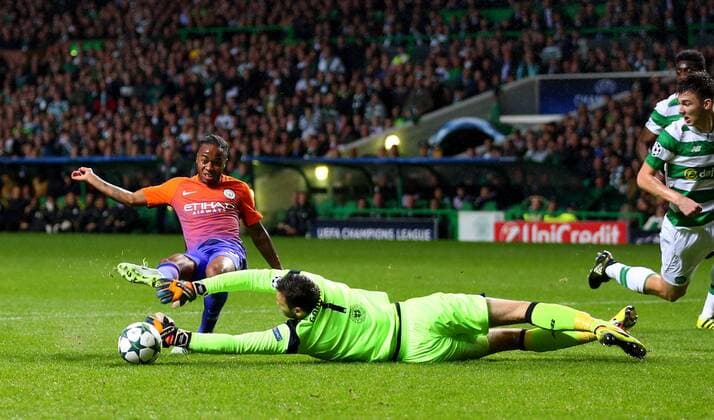 Raheem Sterling of Manchester City scores their second goal past Craig Gordon of Celtic during the Champions League Group C match at the Celtic Park Stadium, Glasgow. Picture date: September 28th, 2016. Pic Simon Bellis Sportimage EDITORIAL USE ONLY. No use with unauthorised audio, video, data, fixture lists, club league logos or live services. Online in-match use limited to 120 images, no video emulation. No use in betting, games or single club league player publications.