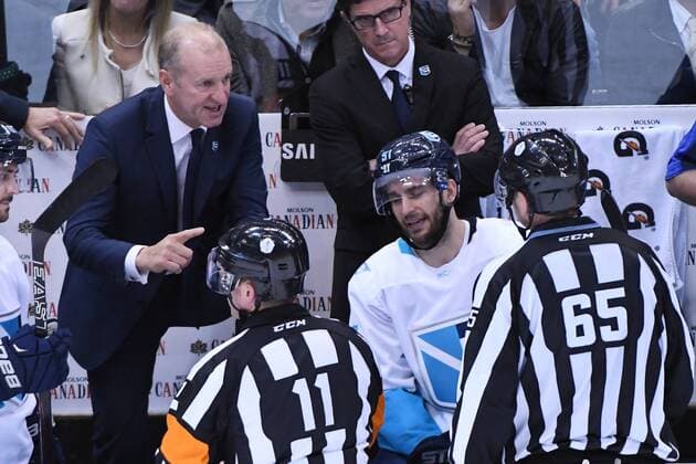 September 27, 2016: Team Europe head coach Ralph Krueger debates a penalty call with referee Kelly Sutherland (11) and linesman Pierre Racist (65) during the first WCOH best of three final game between Team Europe and Team Canada at Air Canada Centre in Toronto. (Photo by Gerry Angus Icon Sportswire) HOCKEY: SEP 27 World Cup of Hockey - Final - Game 1 - Team Europe v Team Canada Icon16092730 EDITORIAL USE ONLY