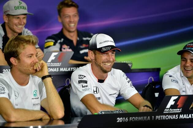 (160929) -- SEPANG, Sept. 29, 2016 -- McLaren driver Jenson Button (C) of Britain smiles during press conference PK Pressekonferenz before the Malaysian Formula One Grand Prix at the Sepang International Circuit in Sepang, Malaysia, Thursday, Sept. 29, 2016.) (SP)MALAYSIA-SEPANG-F1-PRESS CONFERENCE ChongxVoonxChung 