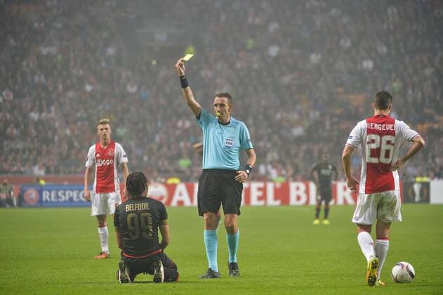 Standard s Ishak Belfodil receives a yellow card from the referee Paolo Mazzoleni during a game of the second day of the group stage of the Europa League competition between Dutch soccer team Ajax Amsterdam and Belgian club Standard de Liege, in Amsterdam, The Netherlands, Thursday 29 September 2016. NICOLASxLAMBERT  x04943767x