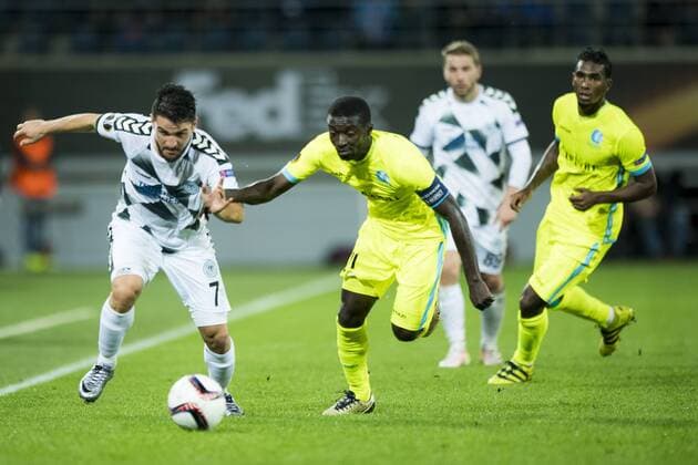 Gent s Kalifa Coulibaly and Gent s Nana Asare fight for the ball during a game on the second day of the group stage (group H) of the Europa League competition between Belgian club KAA Gent and Turkish club Atiker Konyaspor, Thursday 29 September 2016, in Gent. JASPERxJACOBS  x04943802x