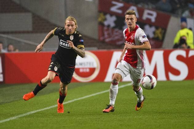 Standard s Jonathan Legear and Ajax s Daley Sinkgraven pictured in action during a game of the second day of the group stage of the Europa League competition between Dutch soccer team Ajax Amsterdam and Belgian club Standard de Liege, in Amsterdam, The Netherlands, Thursday 29 September 2016. NICOLASxLAMBERT  x04943846x