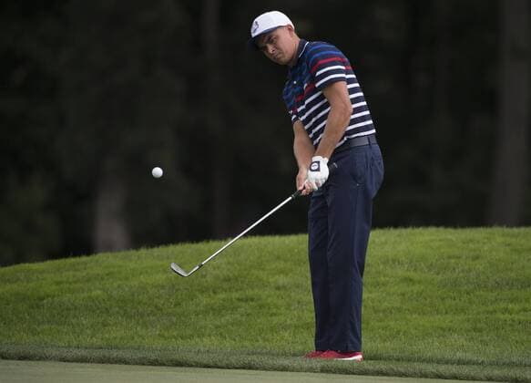 USA Team member Rickie Fowler chips on the 11th hole during a practice round prior to the 2016 Ryder Cup at Hazeltine National Golf Club in Chaska, Minnesota on September 29, 2016.  MIN20160929313 KEVINxDIETSCH
