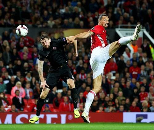 Zlatan Ibrahimovic of Manchester United ManU wins a header during the UEFA Europa League match at Old Trafford Stadium, Manchester. Picture date: September 29th, 2016. Pic Matt McNulty Sportimage EDITORIAL USE ONLY. No use with unauthorised audio, video, data, fixture lists, club league logos or live services. Online in-match use limited to 120 images, no video emulation. No use in betting, games or single club league player publications.