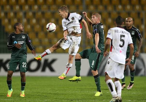 KRASNODAR, RUSSIA - SEPTEMBER 29, 2016: FC Krasnodar s Joaozinho (L), Yuri Gazinsky (2nd R front) and OGC Nice s Vincent Koziello (C front) and Younes Belhanda (R front) struggle for the ball in the 2016 17 UEFA Europe League Group I Round 2 football match at the Kuban Stadium. Krasnodar won the game 5-2. Vitaly Timkiv TASS  TS032CE1