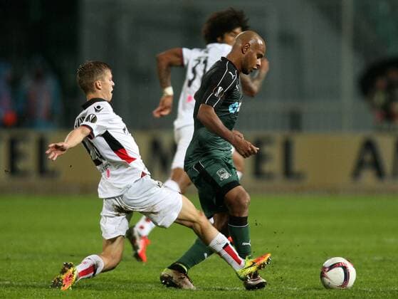 KRASNODAR, RUSSIA - SEPTEMBER 29, 2016: OGC Nice s Vincent Koziello and FC Krasnodar s Ari (L-R front) struggle for the ball in the 2016 17 UEFA Europe League Group I Round 2 football match at the Kuban Stadium. Krasnodar won the game 5-2. Vitaly Timkiv TASS  TS032CE2