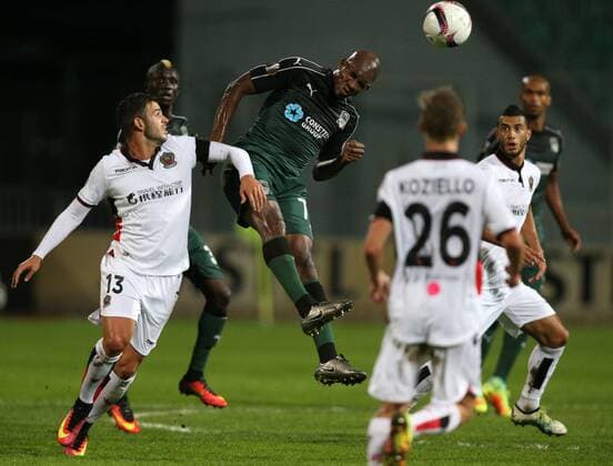 KRASNODAR, RUSSIA - SEPTEMBER 29, 2016: OGC Nice s Valentin Eysseric and FC Krasnodar s Charles Kabore (L-R front) struggle for the ball in the 2016 17 UEFA Europe League Group I Round 2 football match at the Kuban Stadium. Krasnodar won the game 5-2. Vitaly Timkiv TASS  TS032CE5