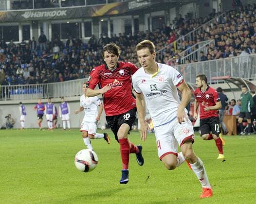(160929) -- BAKU, Sept. 30, 2016 -- Gaetan Bussmann (R) of Germany s Mainz vies with Ruslan Gurbanov of Azerbaijan s Gabala during the UEFA Europa League match in Baku, Azerbaijan, on Sept. 29, 2016. Mainz won 3-2. ) (SP)AZERBAIJAN-BAKU-SOCCER-UEFA EUROPA LEAGUE TofikxBabayev 