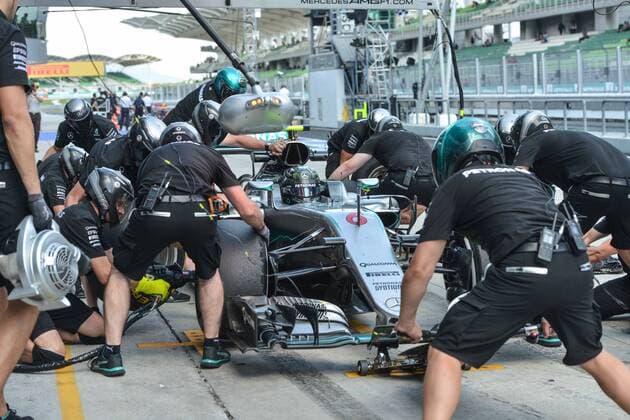 (160930) -- SEPANG, Sept. 30, 2016 -- Mechanics for Mercedes driver Nico Rosberg of Germany work on his car during the second practice session of the Malaysian Formula One Grand Prix at the Sepang International Circuit in Sepang, Malaysia, Sept. 30, 2016. ) (SP)MALAYSIA-SEPANG-F1-PRACTICE SESSION ChongxVoonxChung 