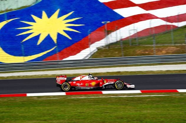 Kimi Raikkoenen (Scuderia Ferrari) mit Malaysischer Flagge im Hintergrund, Grosser Preis von Malaysia 2016, Motorsport, Formel 1, 30.09.2016, Sepang Copyright: xJERRY xEibner-Pressefotox EP_jer