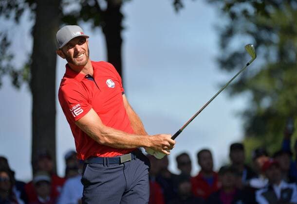 USA team member Dustin Johnson hits off of the 13th tee during day 1 of the 2016 Ryder Cup at Hazeltine National Golf Club in Chaska, Minnesota on September 30, 2016.  MIN20160930309 KEVINxDIETSCH