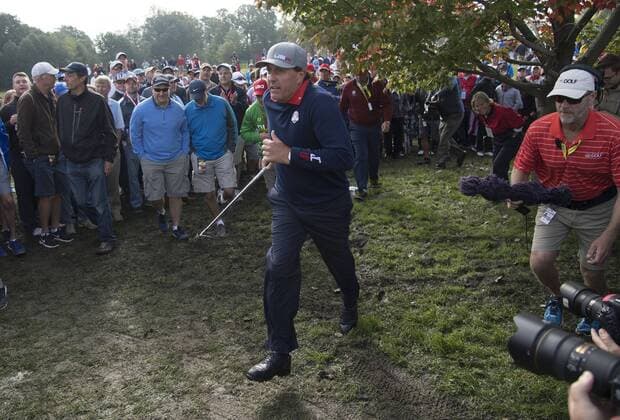 USA team member Phil Mickelson runs to the green after hitting from the deep rough on the 10th fairway on day 1 of the 2016 Ryder Cup at Hazeltine National Golf Club in Chaska, Minnesota on September 30, 2016.  MIN20160930333 KEVINxDIETSCH