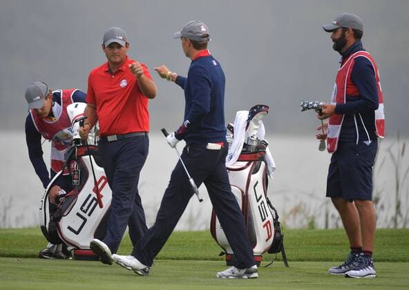 USA team member Jordan Spieth and Patrick Reed celebrate after hitting on the 6th green on day 1 of the 2016 Ryder Cup at Hazeltine National Golf Club in Chaska, Minnesota on September 30, 2016.  MIN20160930341 KEVINxDIETSCH