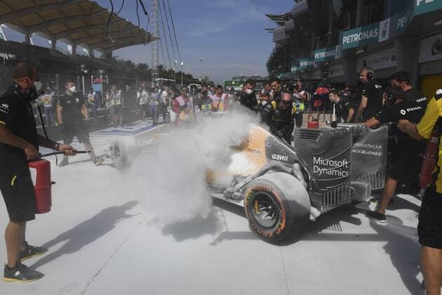 Kevin Magnussen. Test day before Malasia F1 GP at Sepang circuit. In this picture, Kevin Magnussen s car burning. xRUBIOx  RV RACING PRESS
