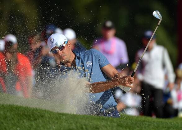 European team member Henrik Stenson hits out of a bunker on the 9th fairway during day 1 of the 2016 Ryder Cup at Hazeltine National Golf Club in Chaska, Minnesota on September 30, 2016.  MIN20160930353 KEVINxDIETSCH