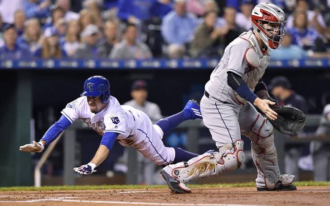September 30, 2016 - Kansas City, MO, USA - The Kansas City Royals Billy Burns scores behind Cleveland Indians catcher Roberto Perez on a single by Eric Hosmer in the first inning on Friday, Sept. 30, 2016, at Kauffman Stadium in Kansas City, Mo. Cleveland at Kansas City - ZUMAm67_