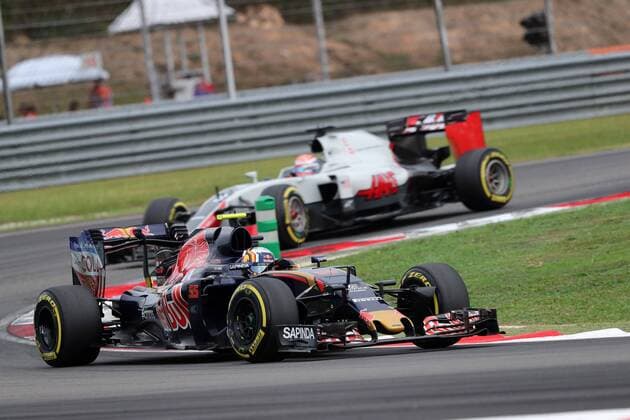 Malaysian Grand Prix, Sepang 29 September - 2 October 2016 01.10.2016 - Qualifying, Carlos Sainz Jr (ESP) Scuderia Toro Rosso STR11 and Romain Grosjean (FRA) Haas F1 Team VF-16 