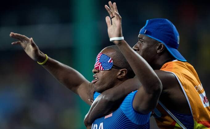 September 11, 2016 - Rio, Brazil - USA s David Brown with his Guide Avery Jerome wins the Gold Medal in the Men s 100m - T11 Final during the fourth day of the 2016 Rio Paralympic Games in Rio de Janeiro, Brazil. 2016 Rio Paralympic Games - Day Four - ZUMAz03_