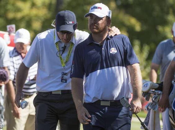 USA team member J.B. Holmes walks with vice-captain Jim Furyk as they leave the 5th hole during day 3 of the 2016 Ryder Cup at Hazeltine National Golf Club in Chaska, Minnesota on October 2, 2016.  MIN20161002321 KEVINxDIETSCH