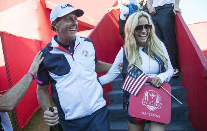 Golf, Ryder Cup 2016 in Chaska USA team member Phil Mickelson and his wife Amy celebrate after the USA won the 2016 Ryder Cup at Hazeltine National Golf Club in Chaska, Minnesota on October 2, 2016. USA defeated Europe 17-11 to win the Ryder Cup for the first time since 2008.  MIN20161002329 KEVINxDIETSCH